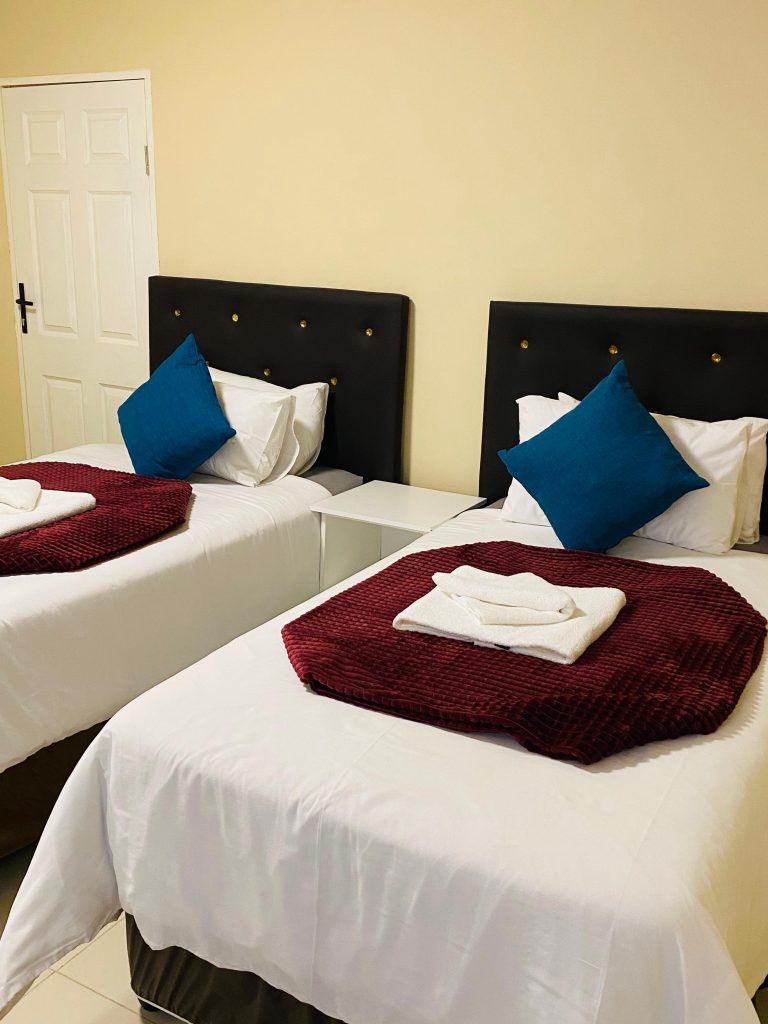 Twin Room with two single beds at Mkhuze Inn.